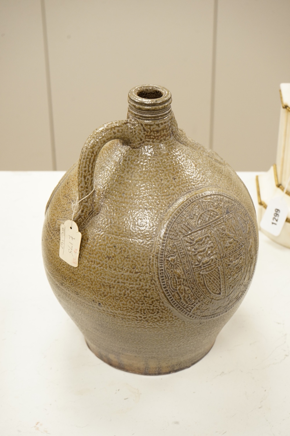 An Elizabeth II coronation commemorative large bellarmine style studio pottery jug, 32cm